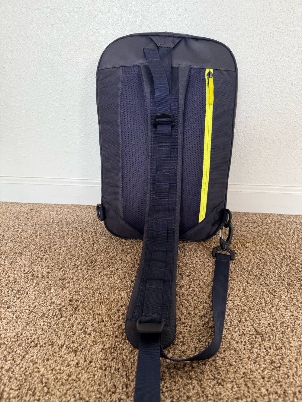 cotopaxi Black Sling Backpack with Blue Piping and Red Zip Pull - Picture 2 of 10